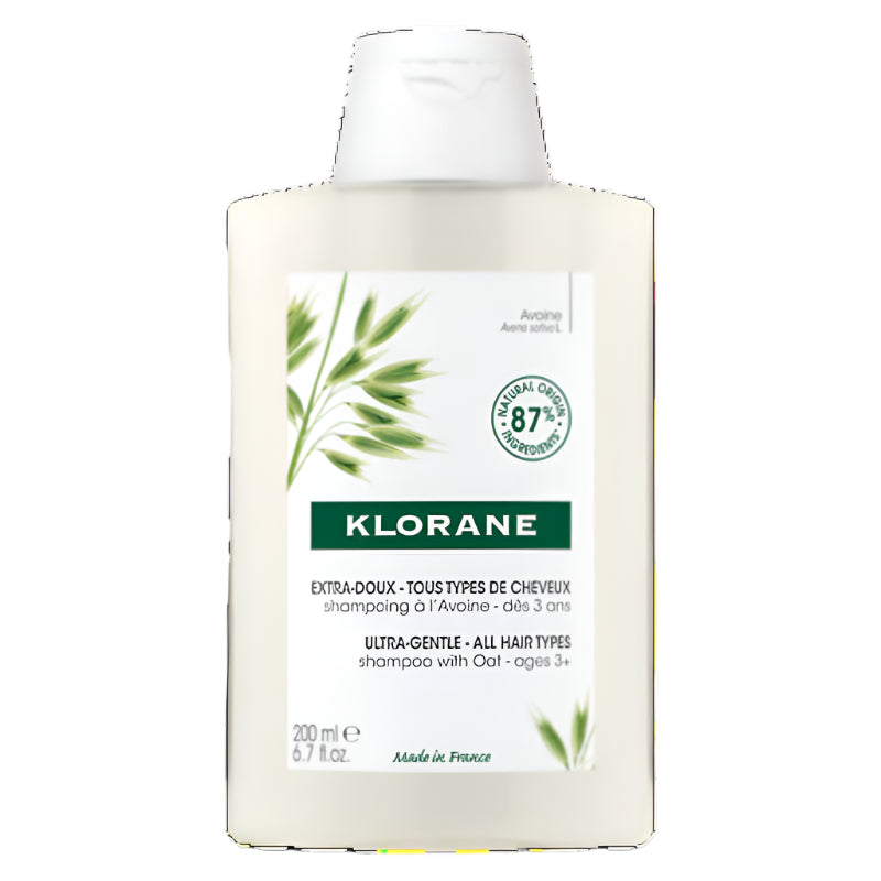 Klorane Oat Milk Shampoo bottle, featuring branding and oat botanical design.