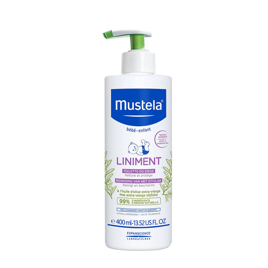 Bottle of Mustela Liniment with a pump dispenser, predominantly white with green and blue accents, and a label indicating it is suitable from birth.